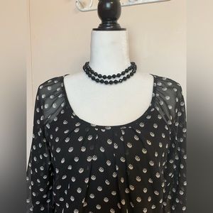Vero Moda polka dot blouse soft ruffles around the hemline , in great condition
